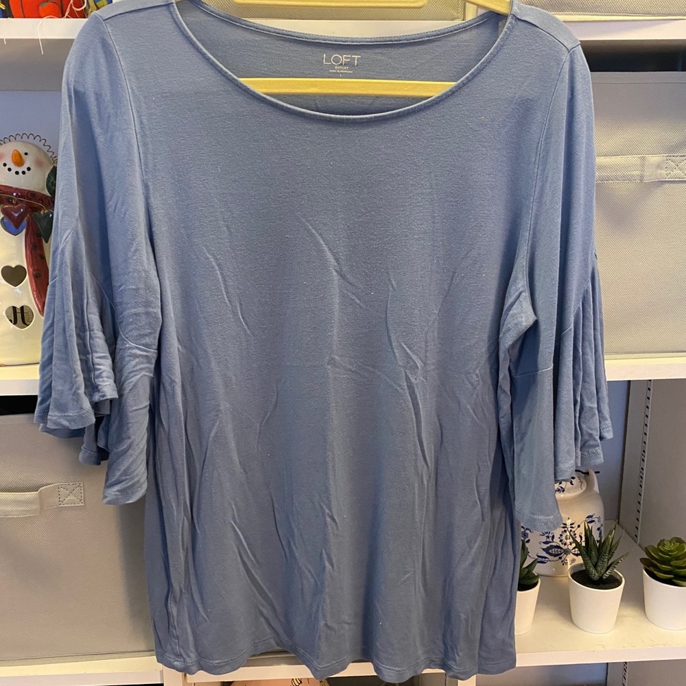 Bell sleeved top